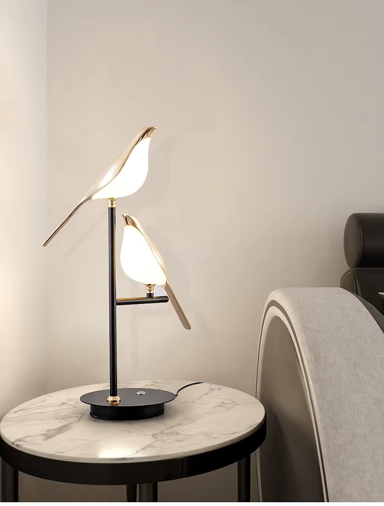 Warm light Bellvian LED bird lamp beside bed, soft bedside lighting for cozy bedroom ambiance.