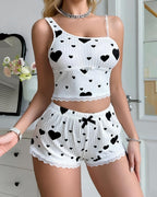Bellvian black heart print cute short pyjama set featuring soft ribbed fabric comfy feminine lounge sleepwear coquette aesthetic kawaii crop top and shorts matching set romantic valentines pyjamas cozy homewear gift for girlfriend and cute luxury nightwear style for women UK