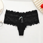 Bellvian black lace cheeky thong panties featuring intricate floral lace design, decorative bow detail and flattering body contouring silhouette, luxury women's lingerie created for confidence, elegance and romantic moments, perfect gift for wife, girlfriend or partner, ideal for luxury underwear collections and intimate fashion shopping throughout the UK.
