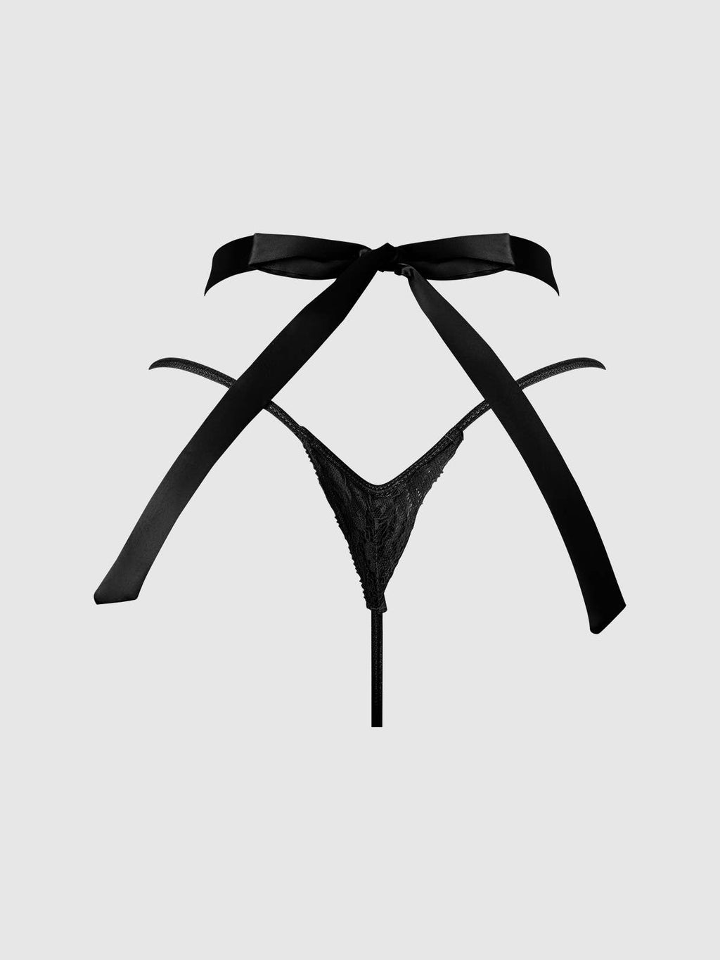 Technical rear design view of black lace thong lingerie with decorative bow back detail, showcasing elegant strappy styling, luxury lingerie craftsmanship and feminine intimatewear inspired by premium boutique lingerie collections.