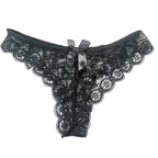 Bellvian black lace thong with a satin bow centre detail and intricate floral lace pattern, combining feminine elegance with everyday comfort, ideal for romantic occasions, anniversaries and shoppers looking for luxury lingerie gifts for her.