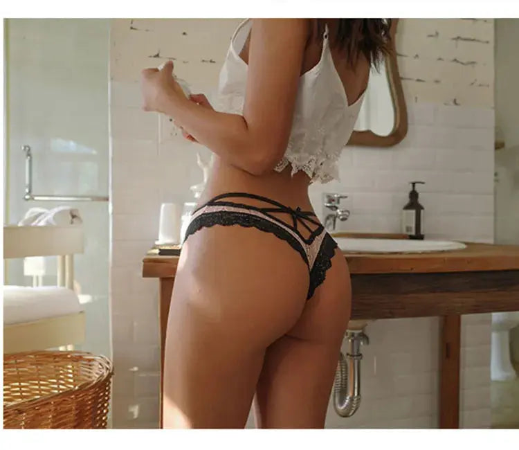 Bellvian black strappy lace panties featuring intricate floral lace fabric, elegant crossover waistband and body flattering silhouette, premium women's lingerie designed for confidence, romance and luxury comfort, ideal gift for girlfriend, wife or partner, perfect honeymoon lingerie, anniversary gift and intimate fashion shopping in the UK.