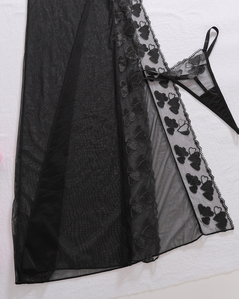Detail view of Bellvian black transparent side slit mesh nightdress with sexy see through lingerie fabric floral embroidery seductive feminine silhouette luxury honeymoon sleepwear valentines nightwear and glamorous bedroom fashion aesthetic for women UK