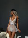 Front view profile of Bellvian™ bridal lingerie white mesh babydoll, featuring a premium sheer embroidered lace bodice with a satin waist ribbon bow and a flowing transparent polka dot tulle mini nightdress for luxury UK honeymoon underwear set shoppers.