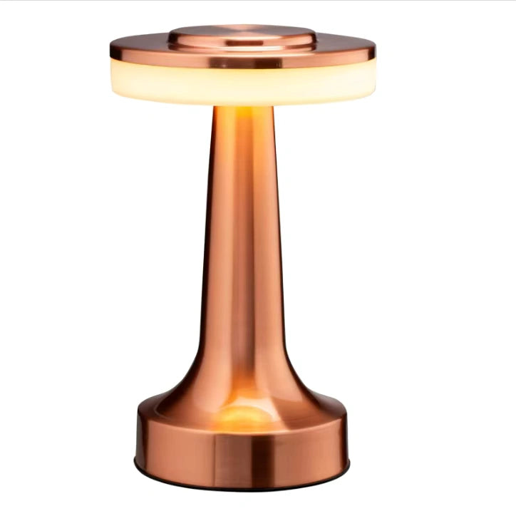 Minimalist bedside table lamp glowing warmly beside a neatly made bed with neutral tones, creating a relaxing bedroom atmosphere  Bellvian lighting.