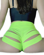 Bellvian neon green cut out booty shorts with scrunch butt lifting fit seamless stretch fabric sexy rave festival shorts body contour shaping support high waisted compression design and curve enhancing fitness dancewear style for women UK