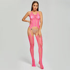 Bellvian pink floral lace bodystocking for women UK featuring sheer fishnet lingerie with open crotch detail and integrated stockings. Romantic lingerie UK perfect for honeymoon, bridal lingerie, Valentine's Day gift for girlfriend, anniversary gift, wedding night outfit and confidence enhancing bedroom wear front full body pose.