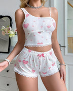 Bellvian pink heart print short pyjama set for women with cute feminine coquette aesthetic soft ribbed sleepwear comfy crop cami top and shorts matching lounge set romantic valentines homewear kawaii pyjamas gift for wife and luxury soft girl nightwear fashion UK