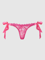 Bellvian pink lace side tie thong with delicate floral lace and feminine satin ribbon bows, luxury lingerie designed for romance, confidence and elegance, perfect gift for girlfriend, wife or bride, ideal for honeymoon lingerie, anniversary celebrations, Valentine's Day surprises, bridal fashion and women searching for premium luxury thong underwear in the UK.