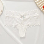 Bellvian white lace cheeky thong panties featuring soft floral lace fabric, elegant feminine styling and comfortable luxury fit, premium women's underwear designed for bridal lingerie collections, honeymoon wardrobes and romantic occasions, perfect gift for bride, wife or girlfriend seeking luxury intimate fashion and premium lingerie in the UK.