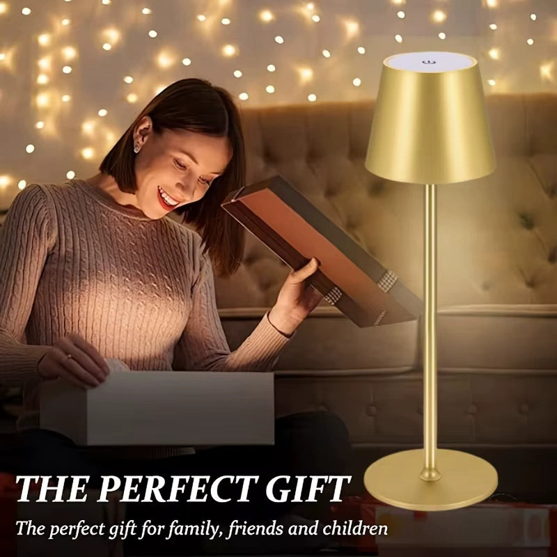 Elegant gold LED table lamp shown as a perfect gift for home decoration. Creates a warm and joyful glow, ideal for gifting family, friends, and loved ones on special occasions.