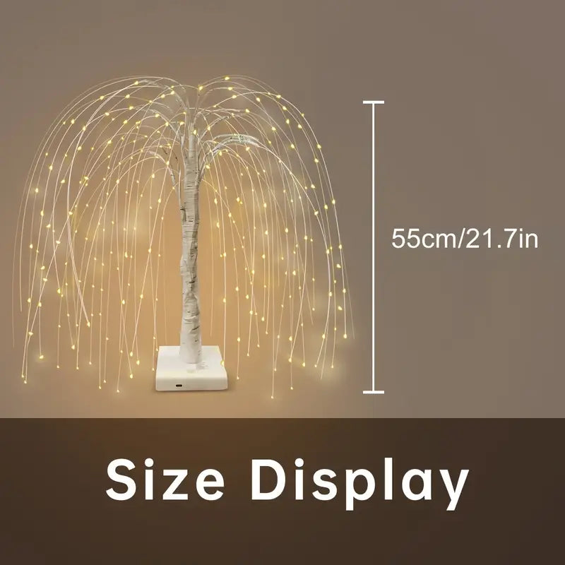 Product size display of LED willow tree lamp showing 55cm (21.7in) height. The lamp features cascading golden lights on flexible wire branches and a white base, ideal for bedroom, living room, or modern decor lighting.